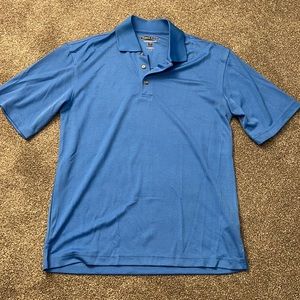Pebble Beach blue polo shirt mens size: small loose